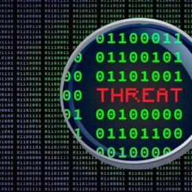 Magnifying glass displays the words threat intelligence